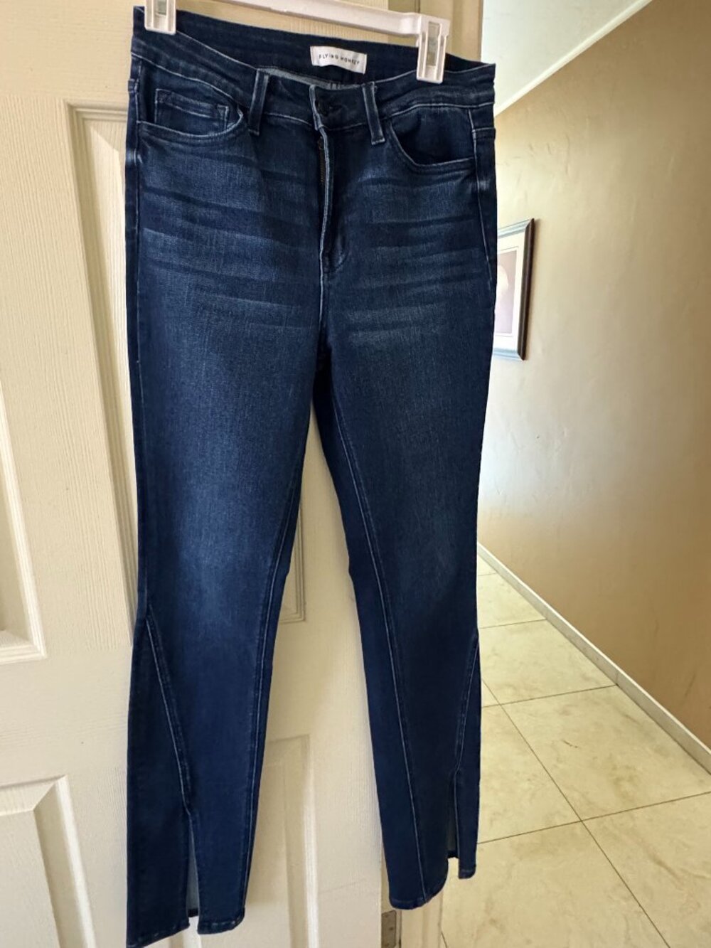 Flying Monkey Hebe High Rise Slit Hem Slim Straight Jeans in a dark blue wash
